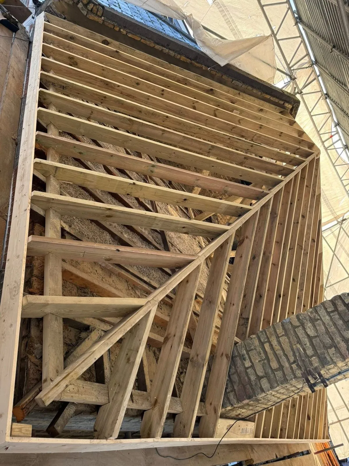 New roof timbers and rafters during a re-roof in Dartmouth