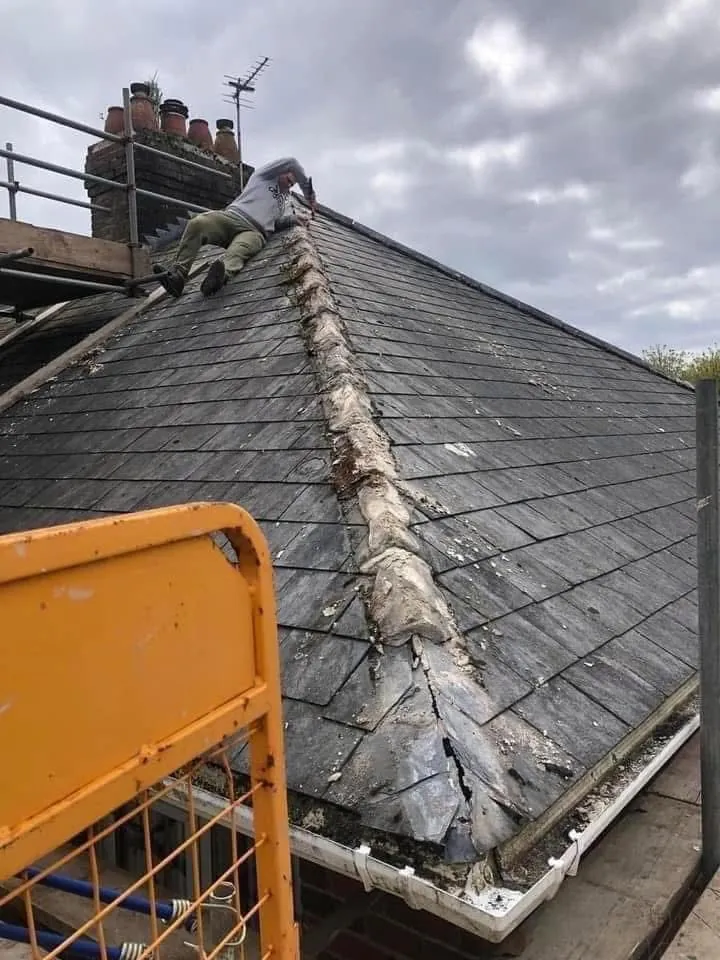 Slate roof ridge and chimney repair in Dartmouth
